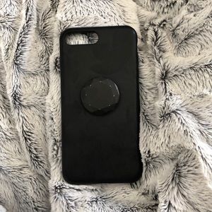 Black IPhone 8 Plus case with pop socket